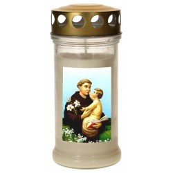 Candle in glass with golden...